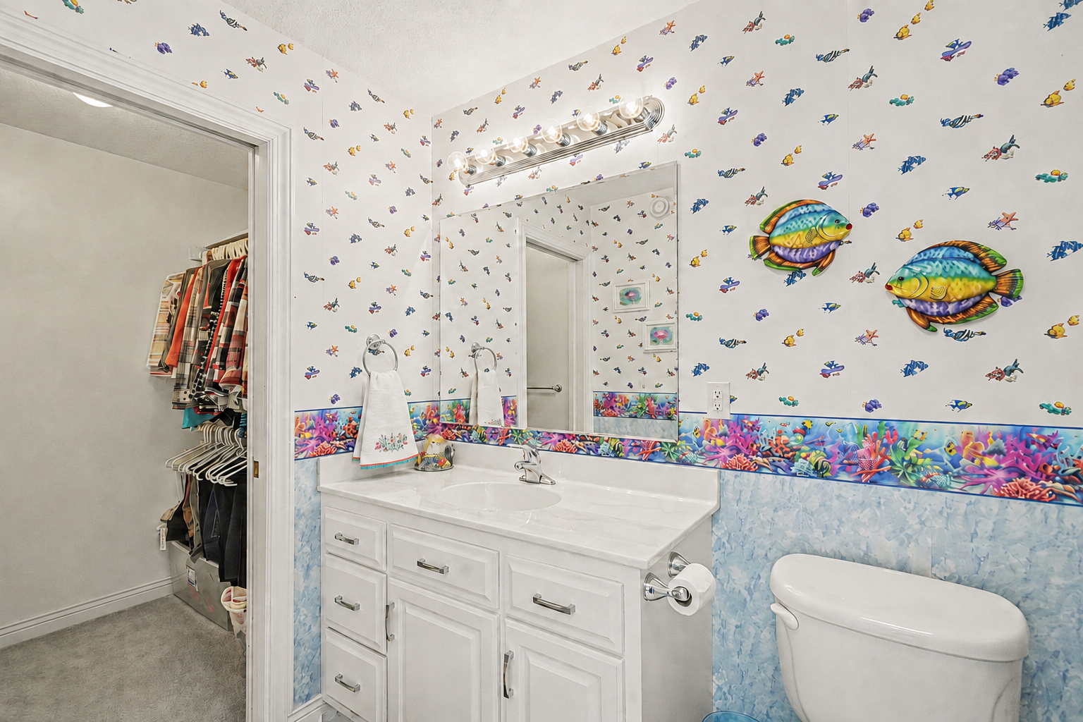 This upper-level junior suite offers its own full bathroom and walk-in closet, creating a comfortable private retreat with the convenience and separation guests or family members will appreciate.