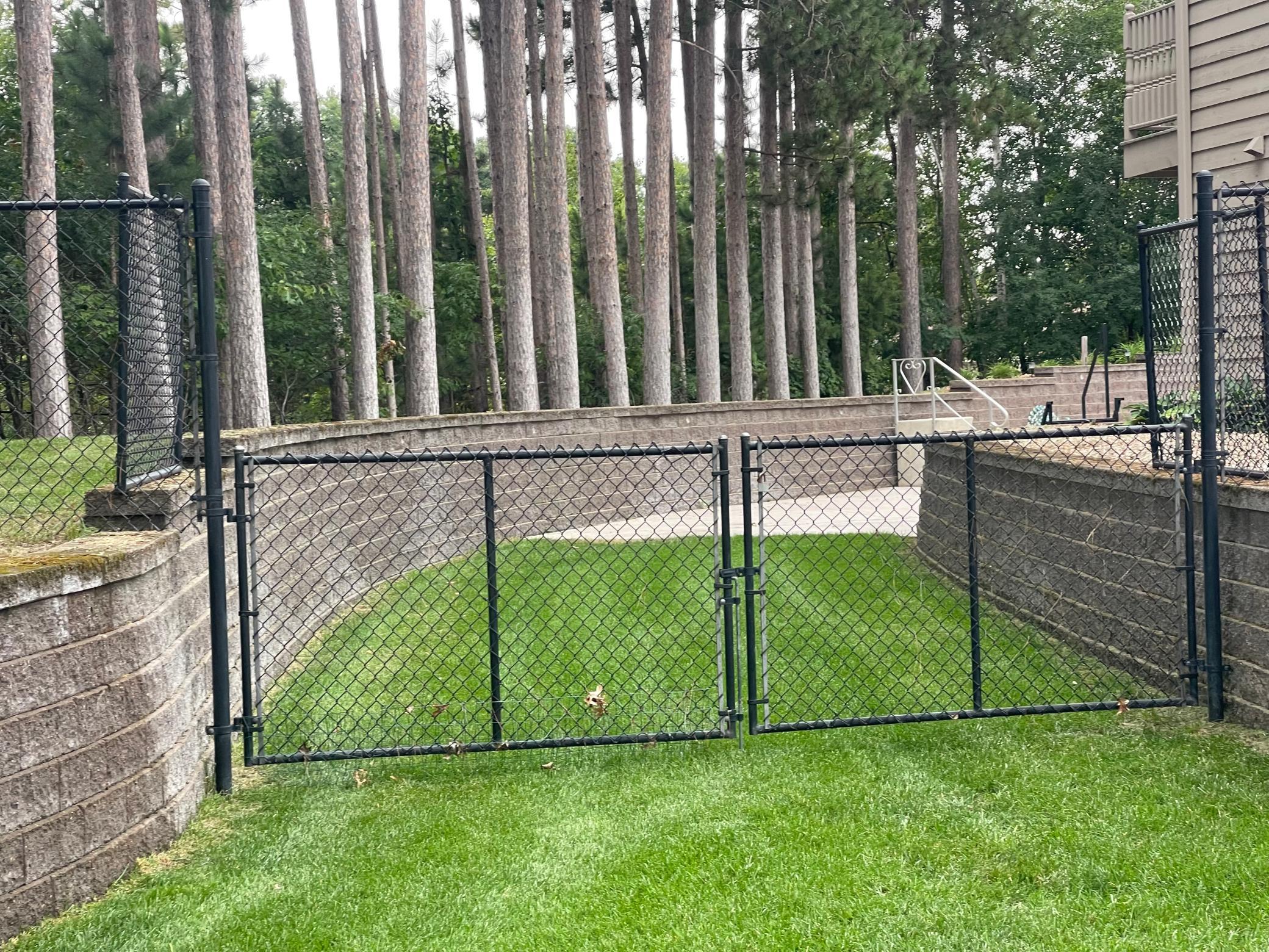 The gated side yard provides convenient access for moving and storing recreational toys such as boats, campers, trailers or ATVs. A practical feature that adds even more flexibility to this already versatile property.