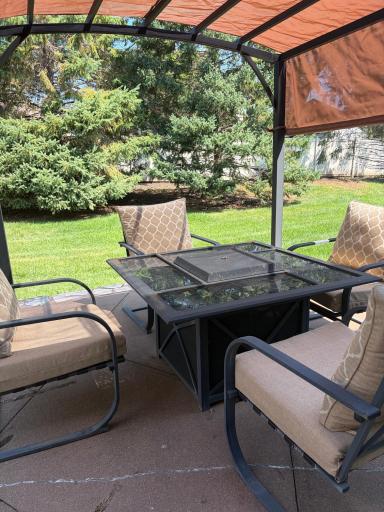 Chairs, cushions, firepit and awning offered as part of the sale