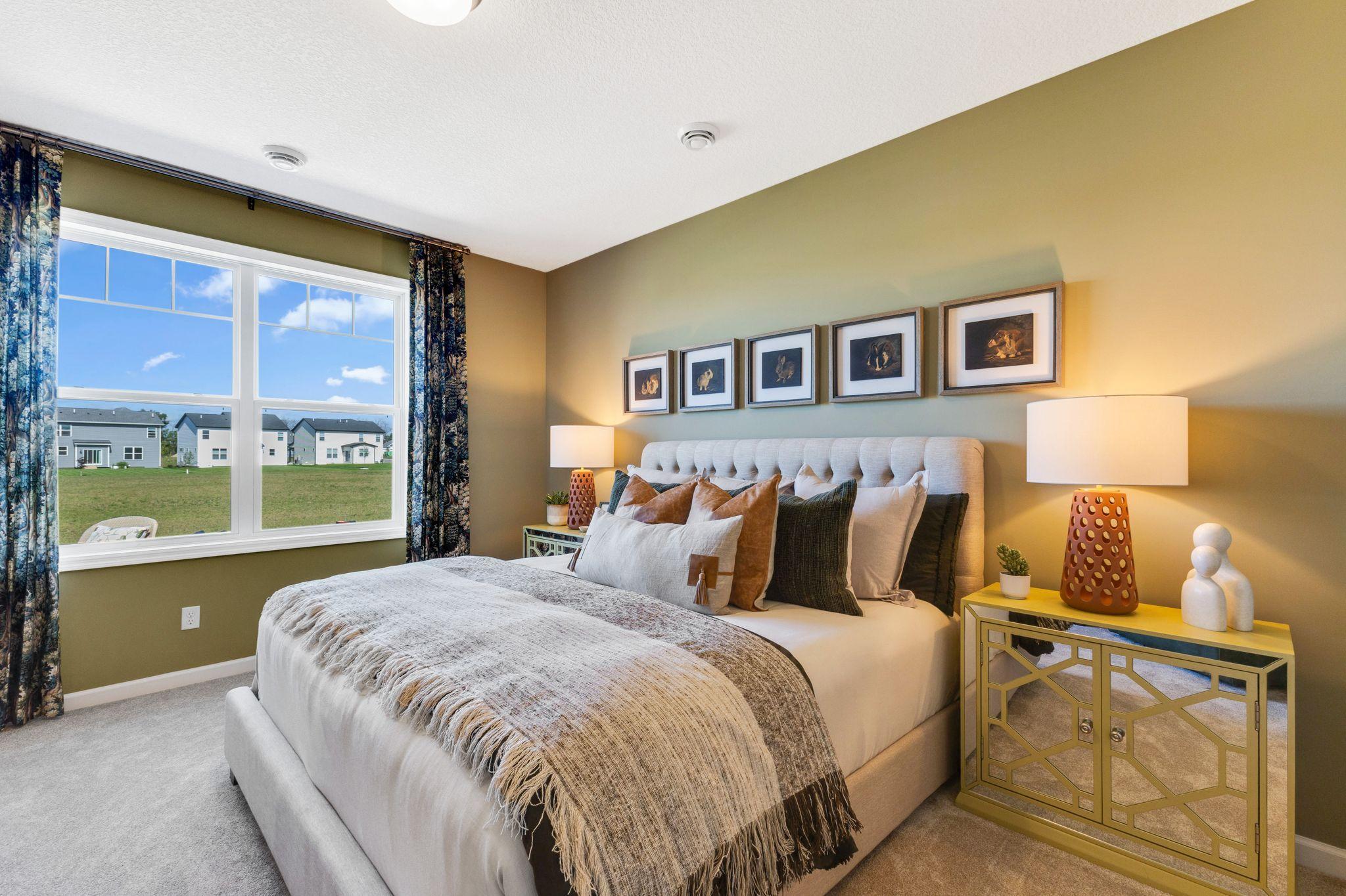 Oversized owner's suite has a private bathroom with a linen closet and a HUGE walk-in closet!