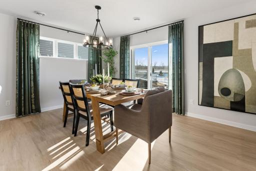 Informal dining room - Photo is representational of approx. floorplan. Staged model. Finishes will be different than actual home.
