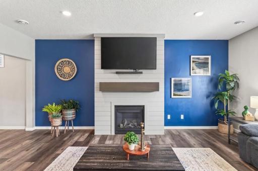 A warm and inviting focal point in the living room, this fireplace creates the perfect spot to relax, unwind, and gather with family and friends.