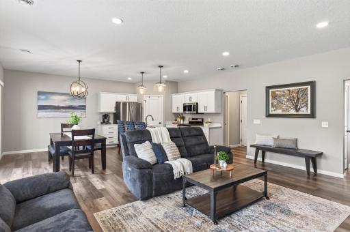 Bright, seamless open-concept living! ? From the crisp white kitchen and dining space to the cozy, light-filled living area, this layout is made for effortless entertaining and everyday comfort.