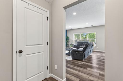 With the garage entry located right near the living room and kitchen , coming and going is a breeze! Drop the bags, kick off your shoes, and step right into the heart of the home—perfect for busy everyday life. Conveniently located by main level bath