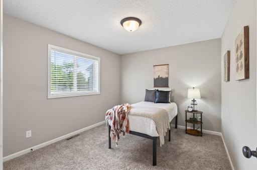 Bright, comfortable, and versatile, this third bedroom offers a private retreat.