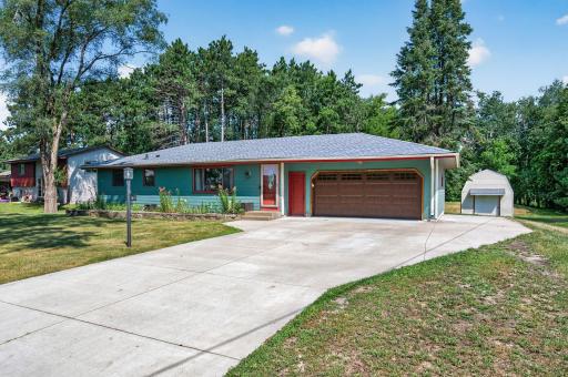 Beautifully maintained home with concrete driveway