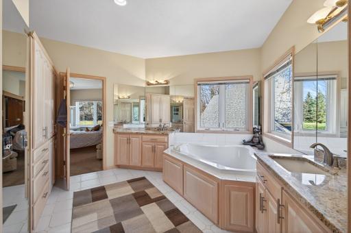 Huge primary bathroom with tons of natural light