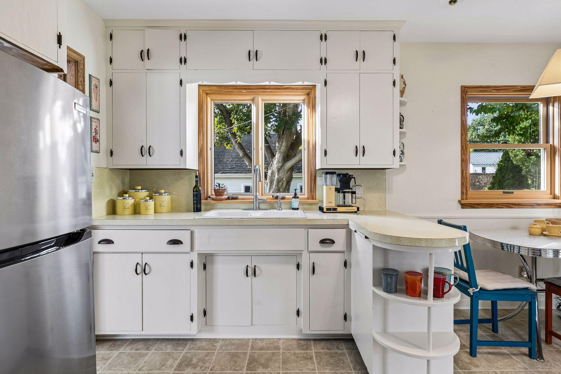 Kitchen with original cabinets and countertops
