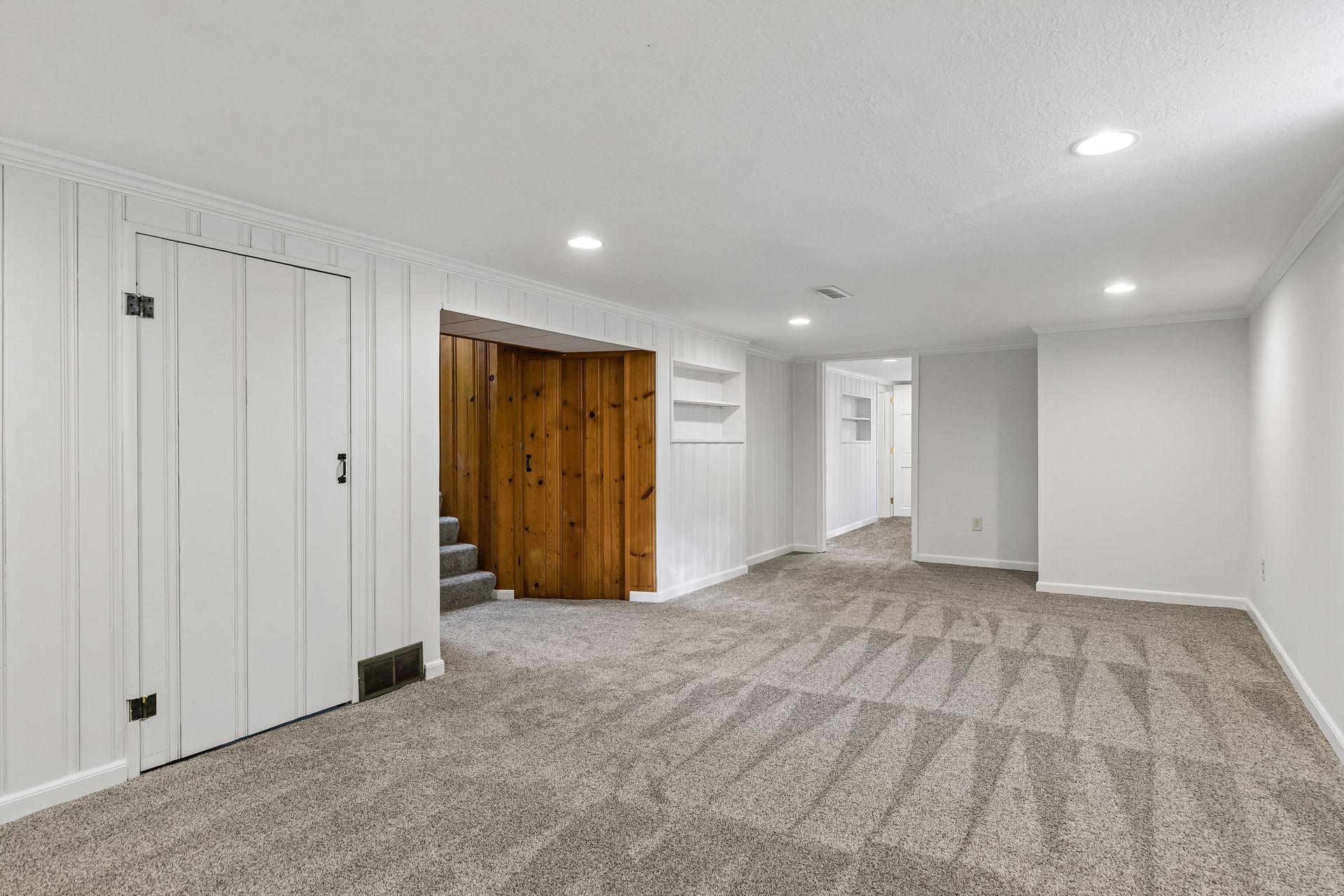 Family room opens to the utility room and the updated third bedroom and three quarter bath
