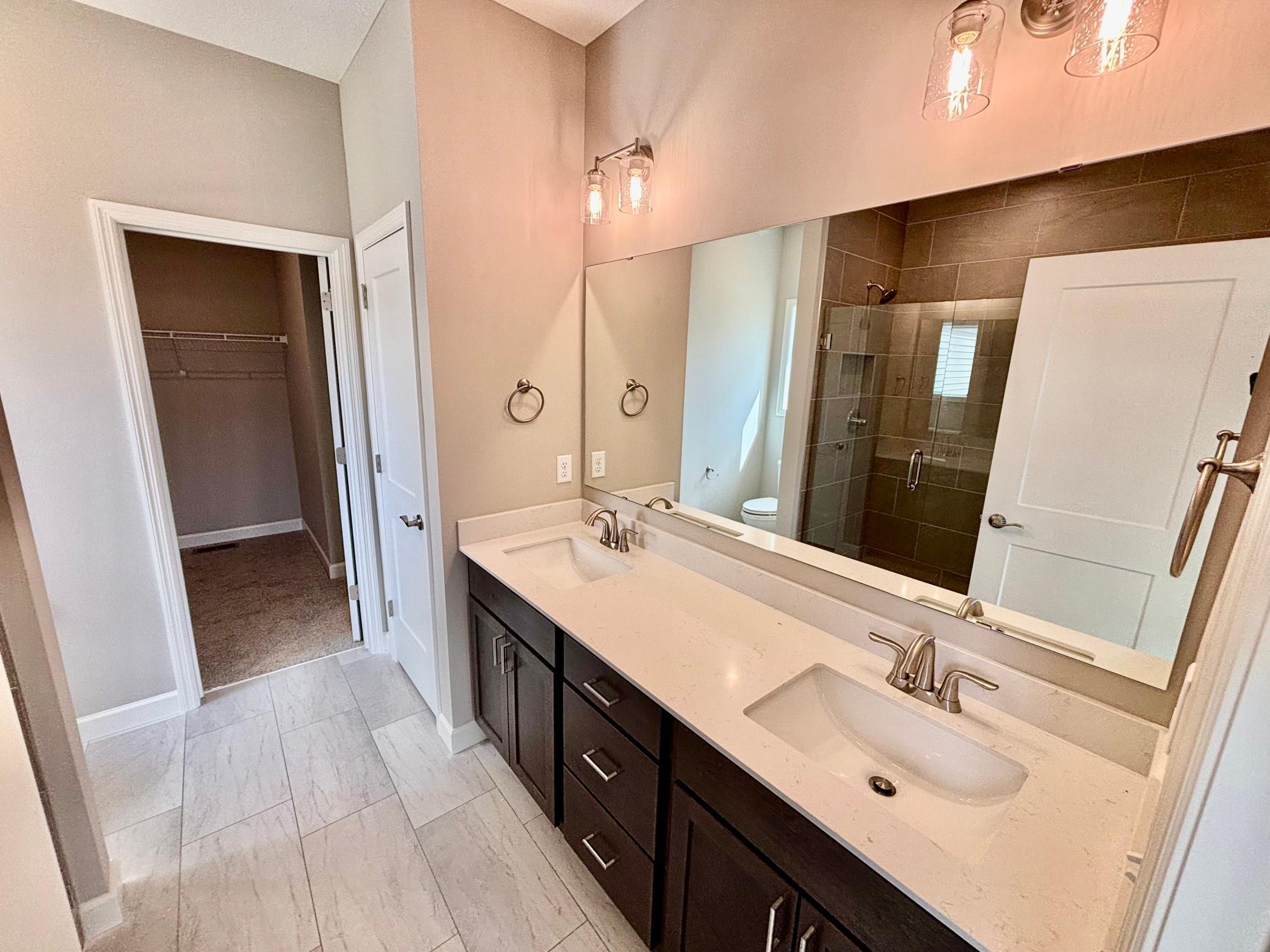 Primary Bathroom - The Madison Rambler at 937 Kepler Ave NE in Oakview Ridge!