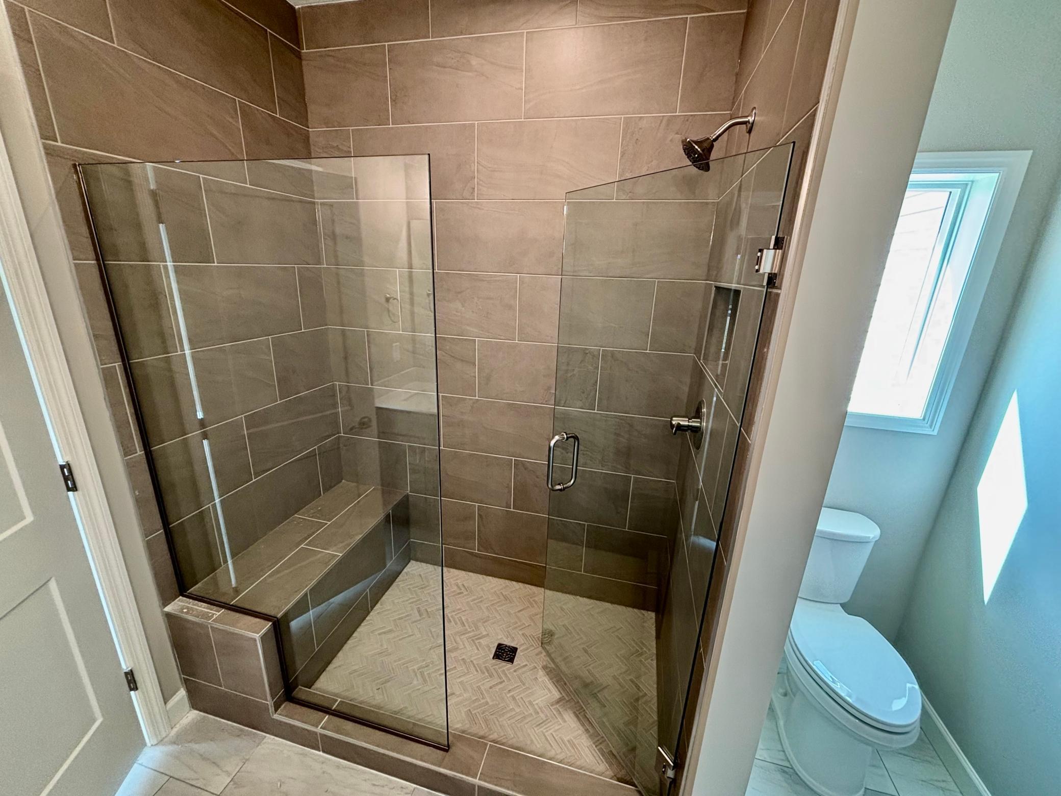 Primary Bathroom Luxury Shower - The Madison Rambler at 937 Kepler Ave NE in Oakview Ridge!