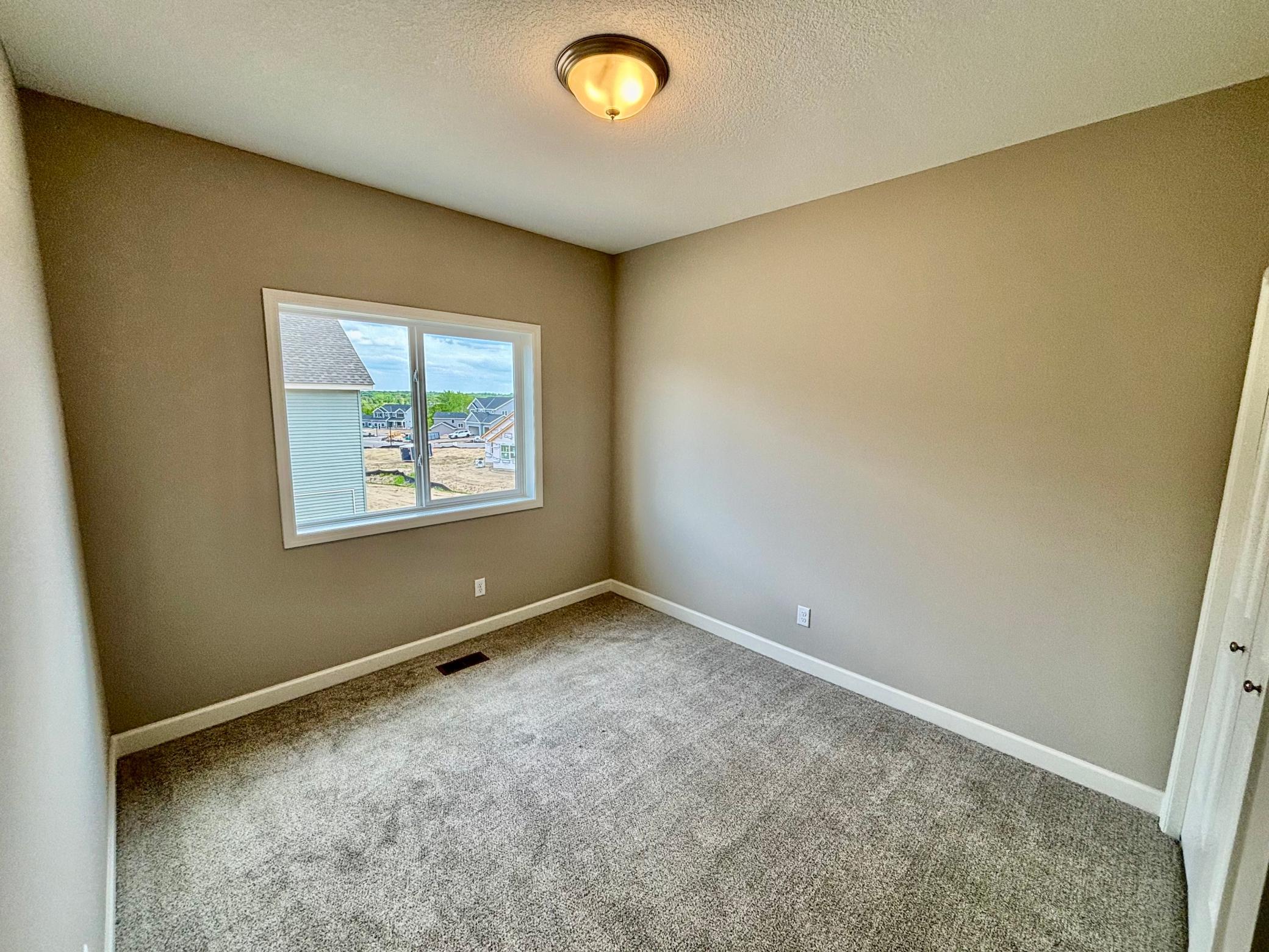 Main Level Bedroom 3 - The Madison Rambler at 937 Kepler Ave NE in Oakview Ridge!