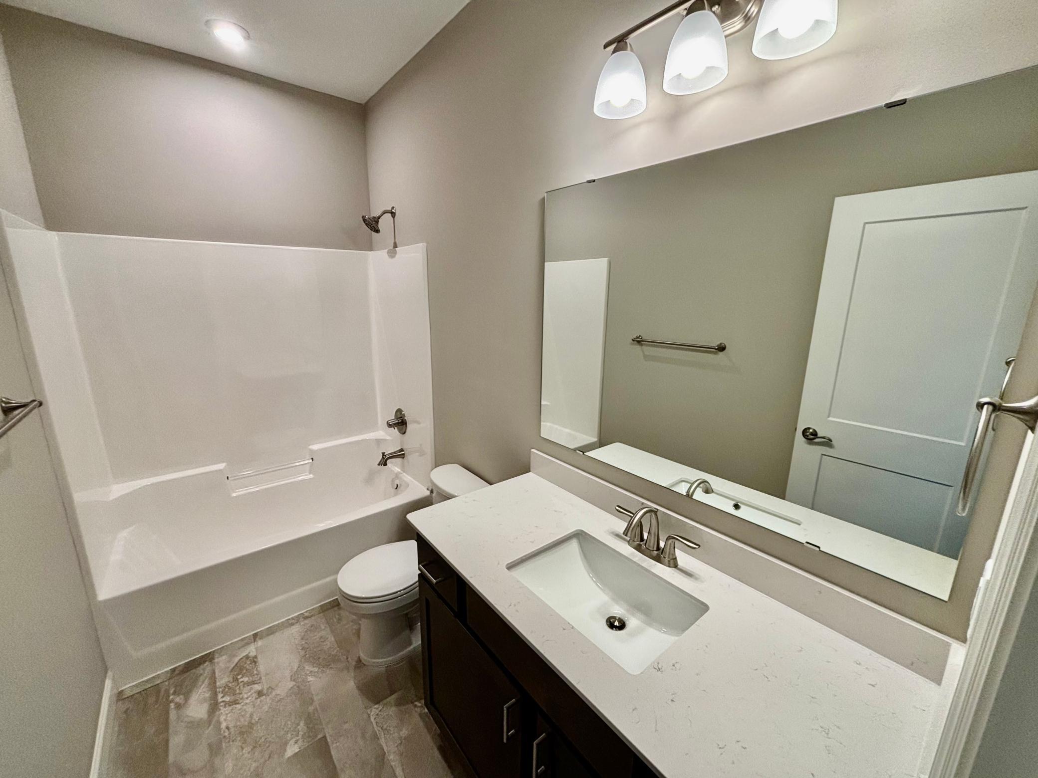 Main Level Hall Bath - The Madison Rambler at 937 Kepler Ave NE in Oakview Ridge!