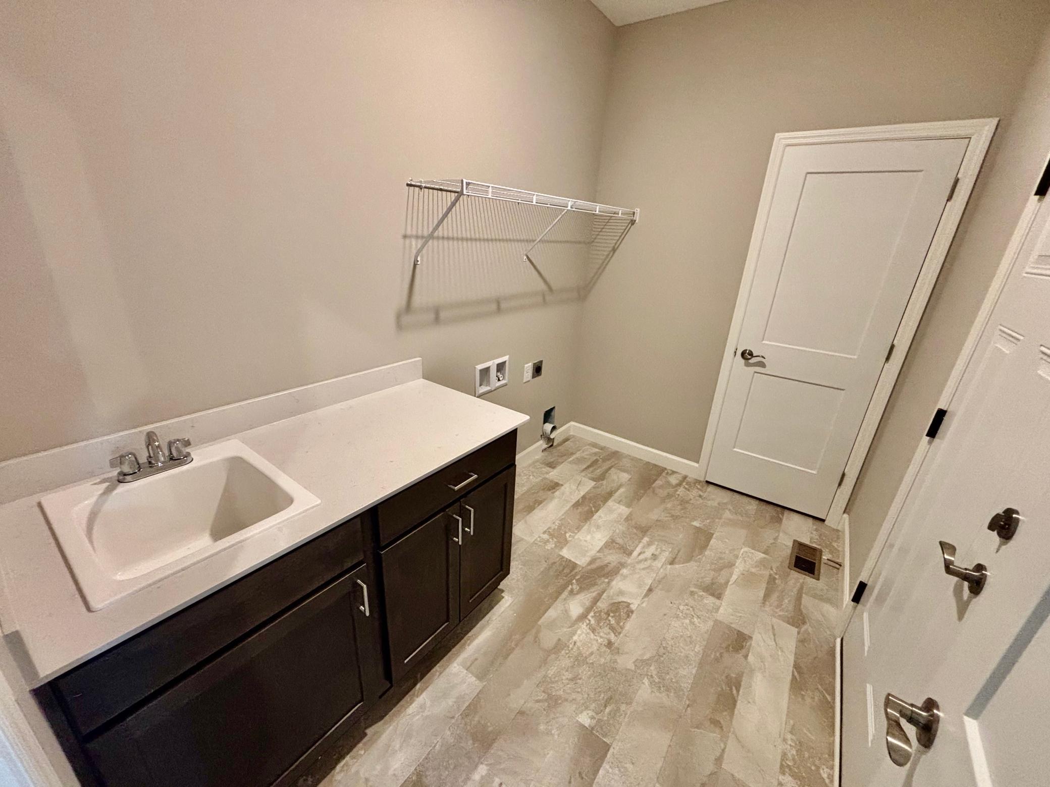 Main Level Laundry - The Madison Rambler at 937 Kepler Ave NE in Oakview Ridge!