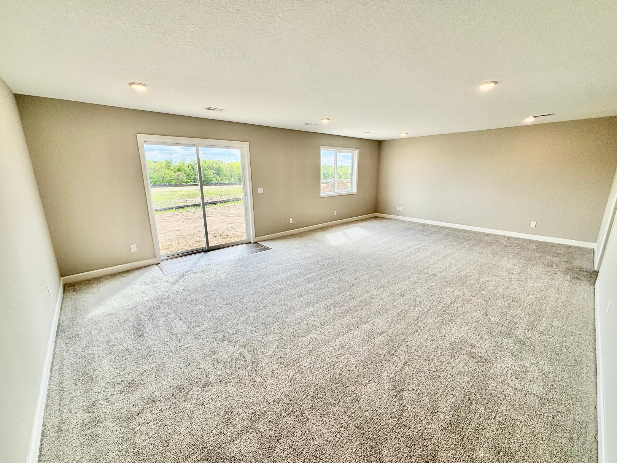 Finished Walkout Lower Level - The Madison Rambler at 937 Kepler Ave NE in Oakview Ridge!