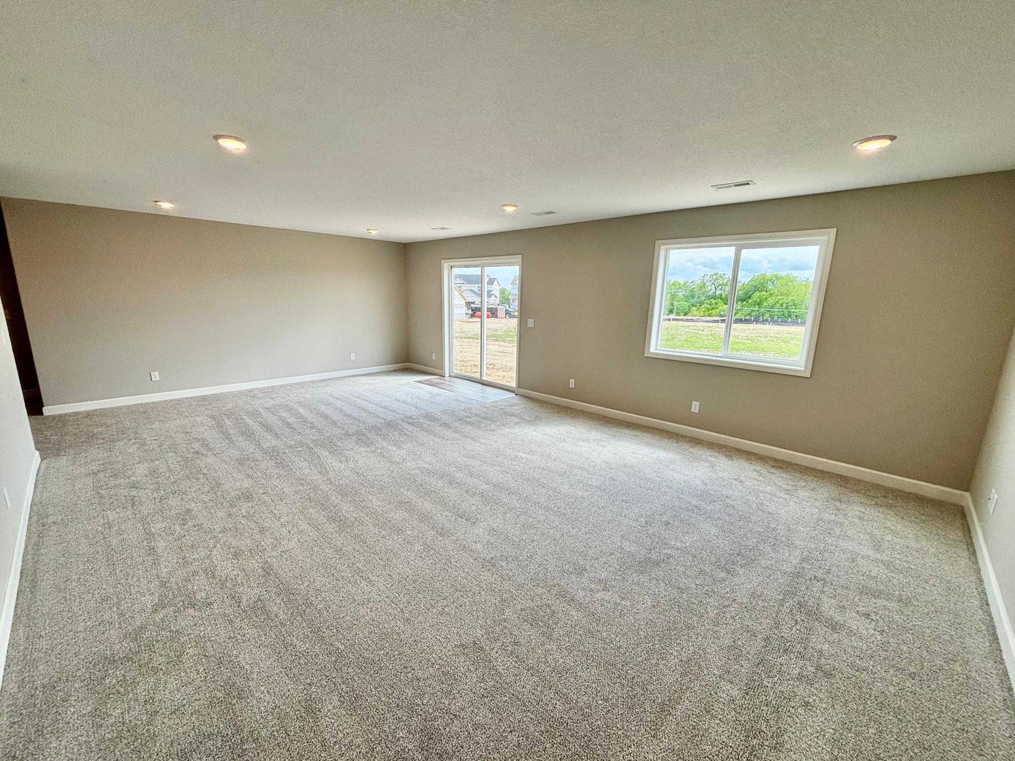 Finished Walkout Lower Level - The Madison Rambler at 937 Kepler Ave NE in Oakview Ridge!