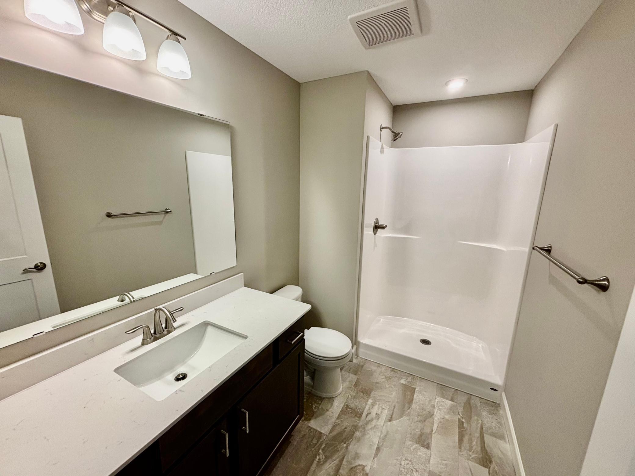 Lower Level 3/4 Bathroom - The Madison Rambler at 937 Kepler Ave NE in Oakview Ridge!