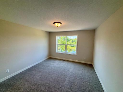 Upper Level Bedroom with Ensuite Bath - The Sedona at 920 Kepler Ave NE in Oakview Ridge!