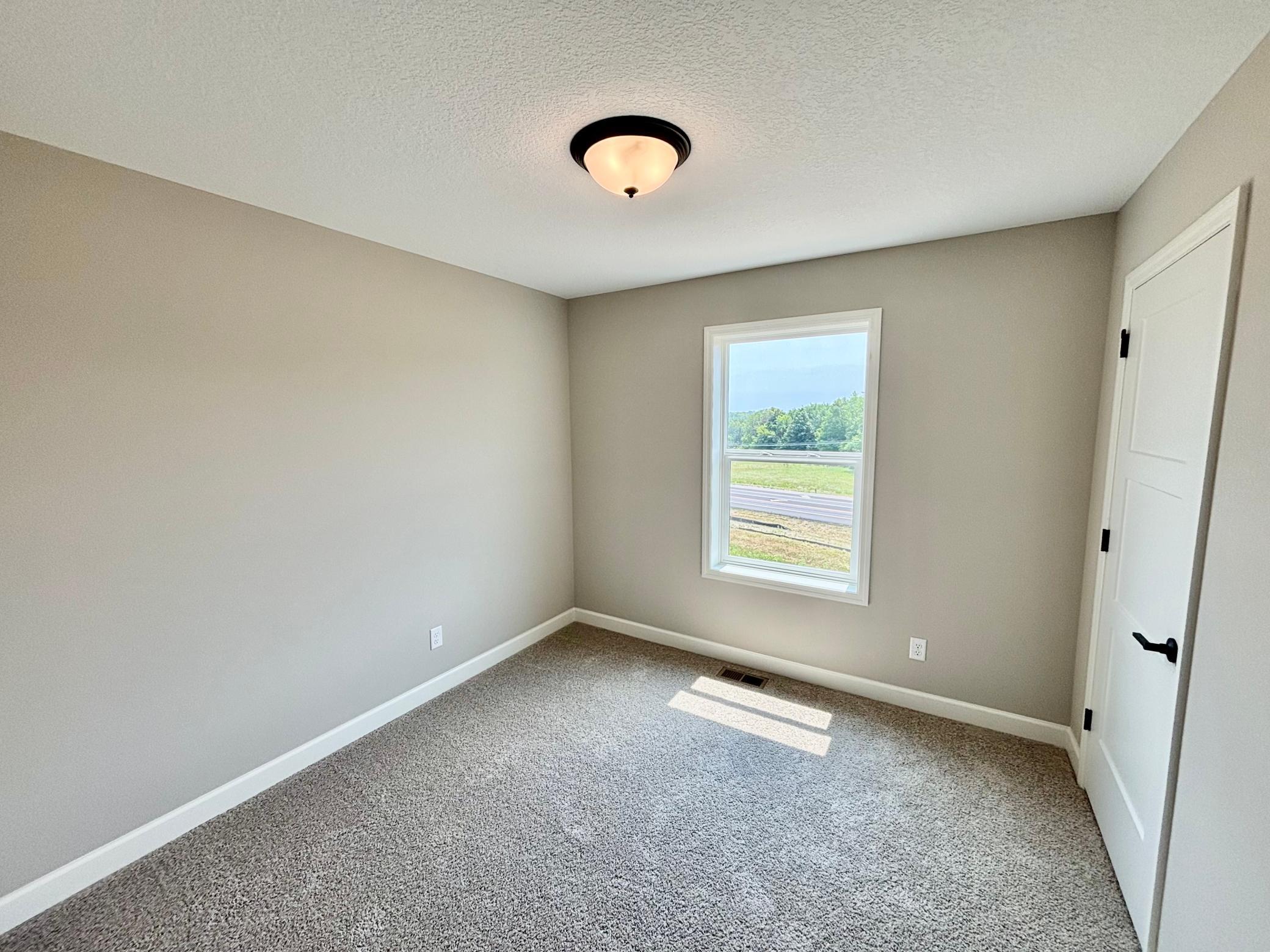 Upper Level Bedroom 2 - The Hillcrest at 837 Walnut Grove Lane in Oakview Ridge!