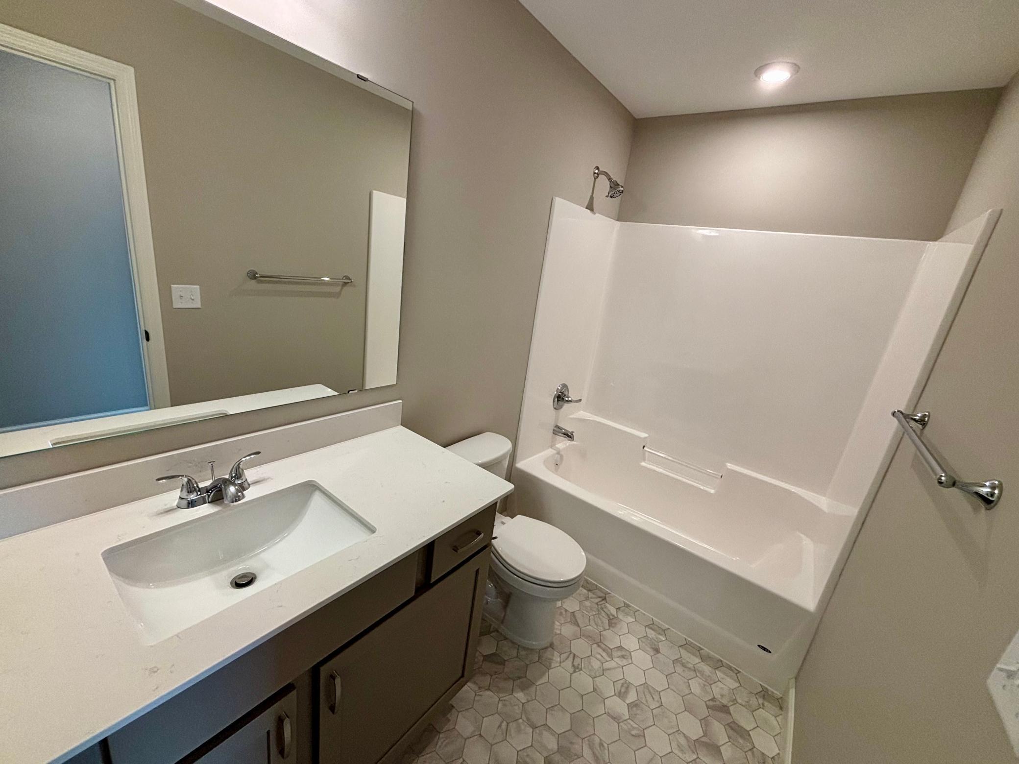 Upper Level Hall Bath - The Hillcrest at 837 Walnut Grove Lane in Oakview Ridge!