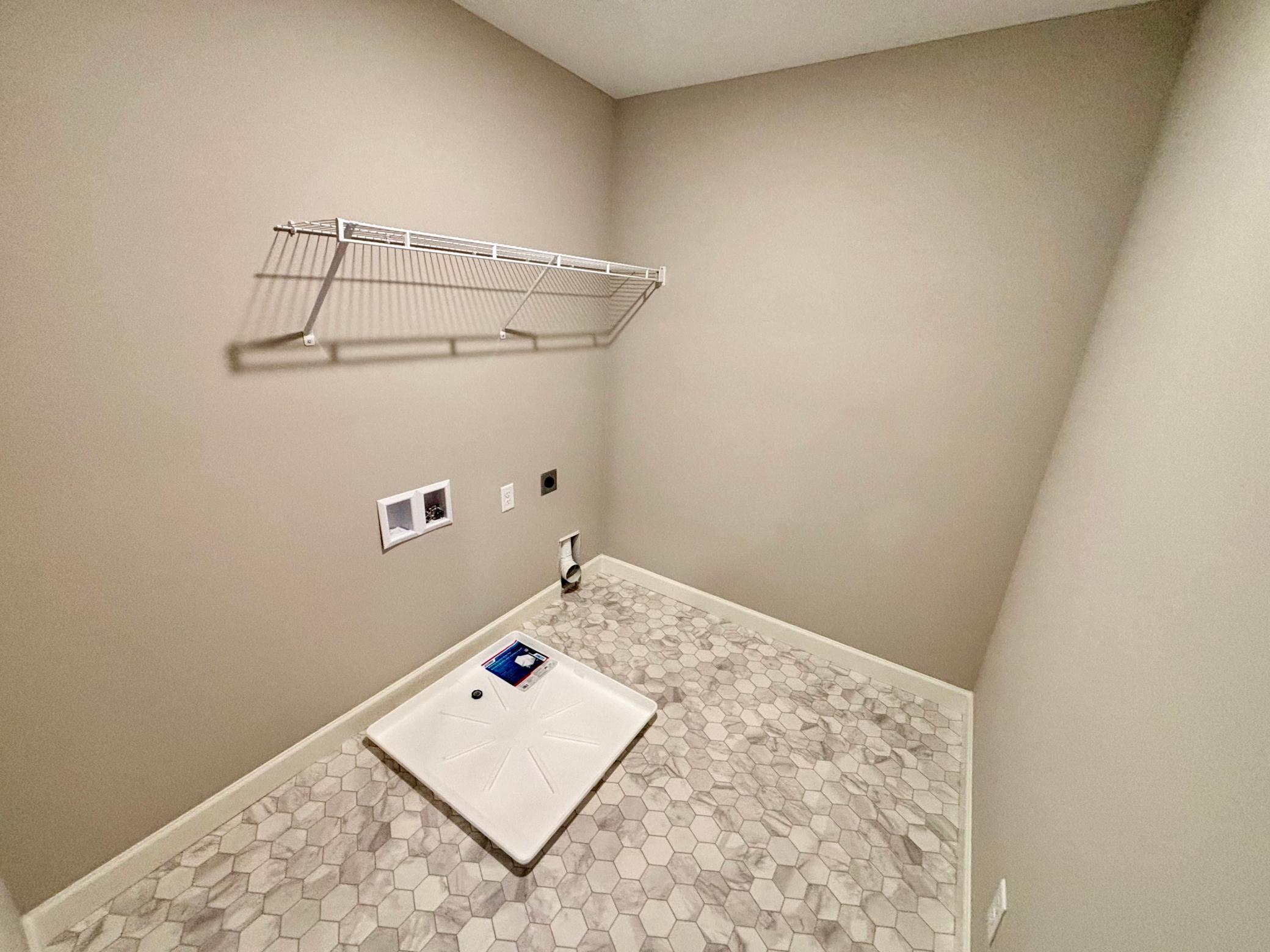 Upper Level Laundry - The Hillcrest at 837 Walnut Grove Lane in Oakview Ridge!