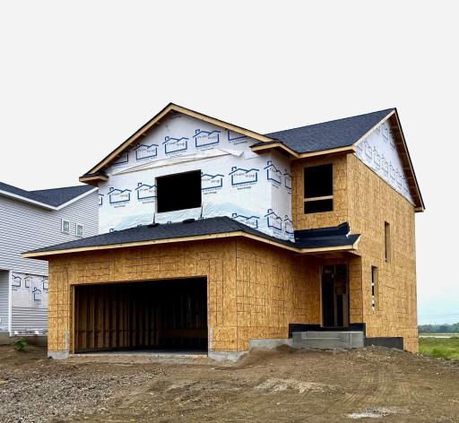 3050 Jandura Ave NE- Home is currently under construction offering an estimated November move-in. Windows and doors will be installed soon.