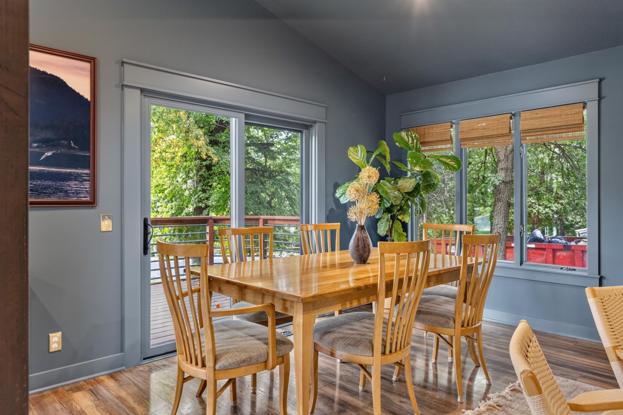 Dining Room features full glass patio door with access to the deck and property