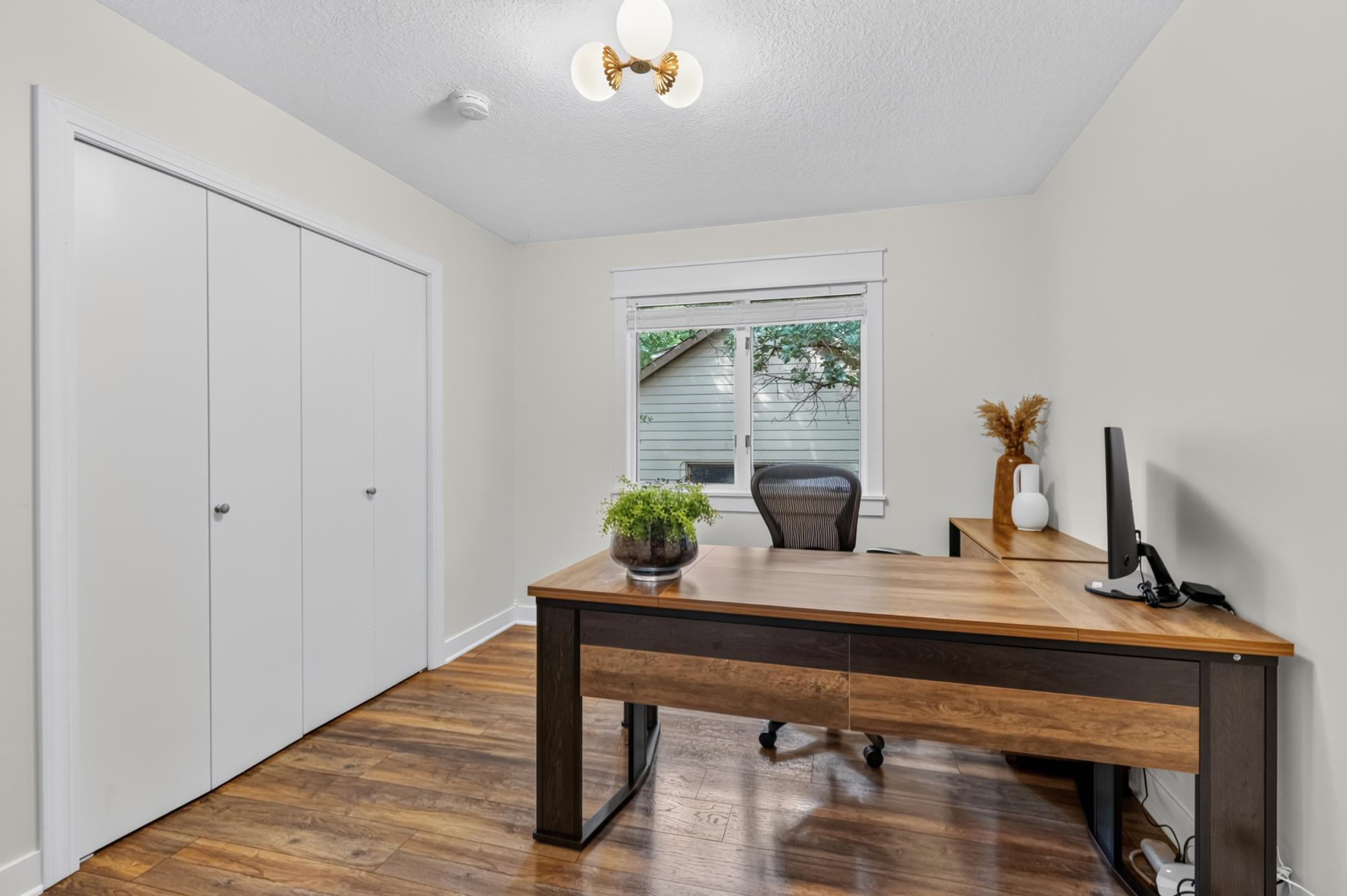 Bedroom 2 features Luxury vinyl plank flooring (currently being used as an office)
