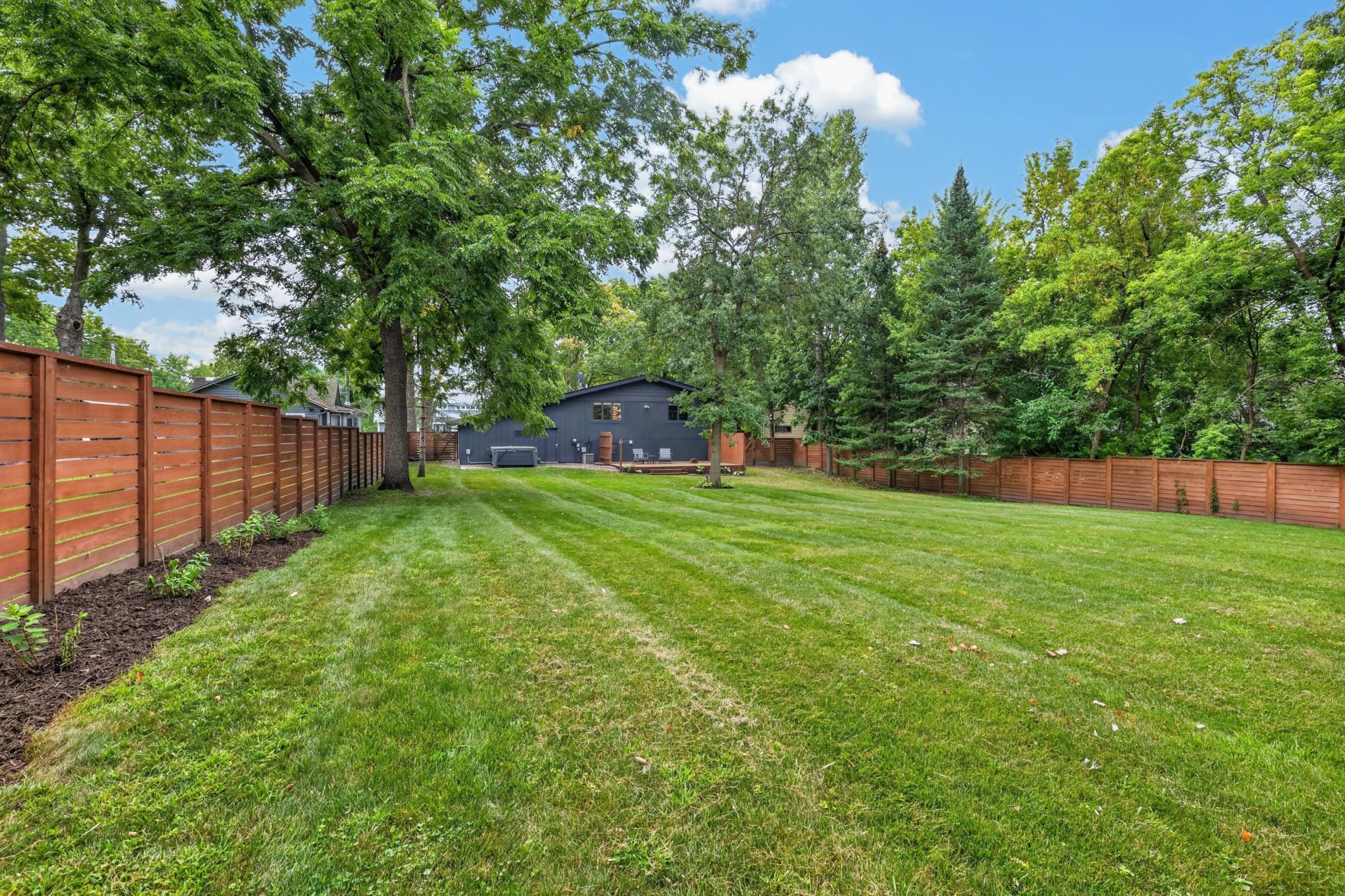 Home proudly sits on a .44 acre lot, steps away from downtown Prior Lake