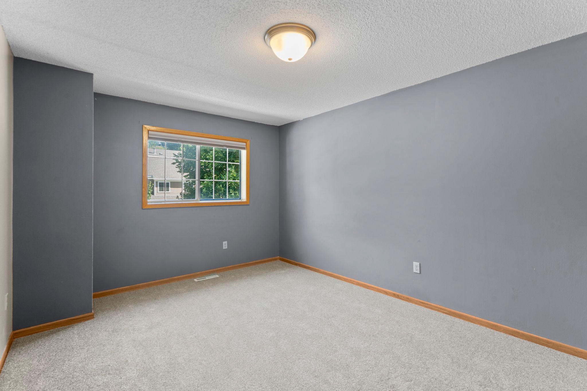 Large second bedroom on the upper level.