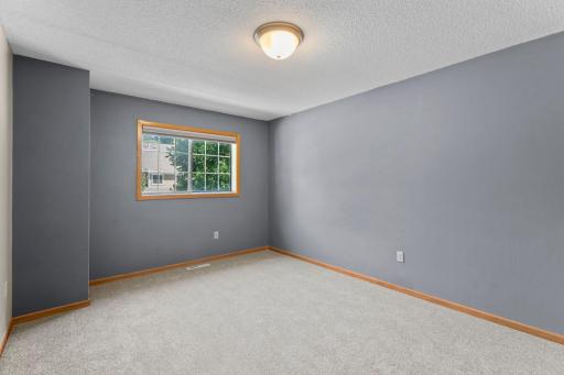 Large second bedroom on the upper level.