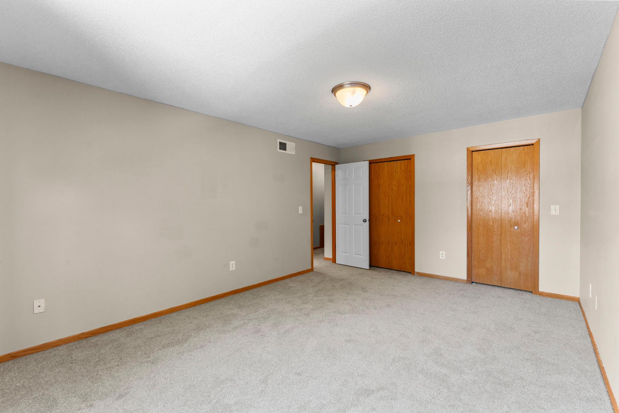 Two closets in the owner's bedroom, one is a large walk-in.