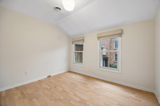 Comfortable second bedroom with generous space and natural light.
