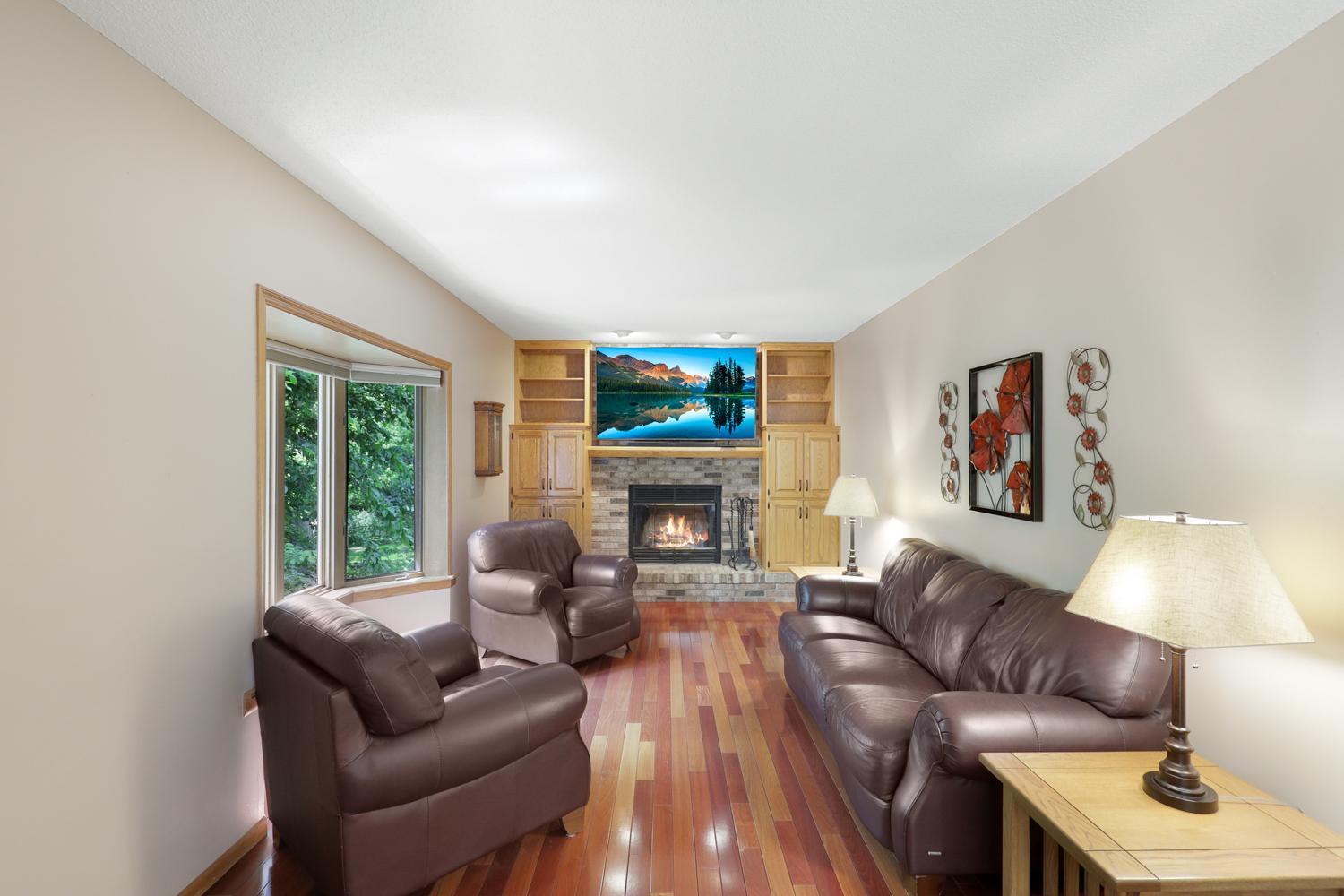 Family room with wood burning fireplace