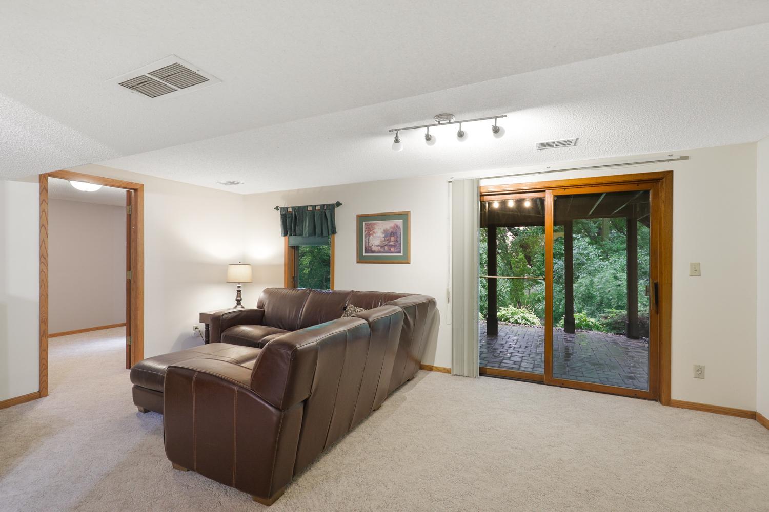 Lower level family room with a walkout basement