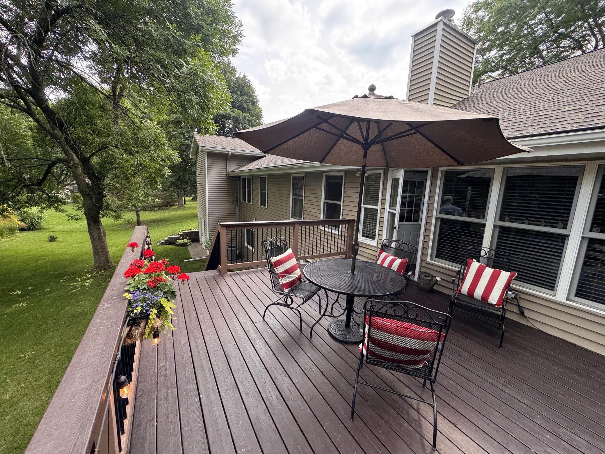 Large deck overlooking backyard