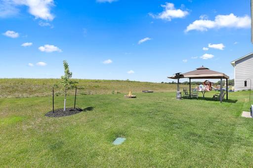 Enjoy peaceful evenings out here gathered around the firepit