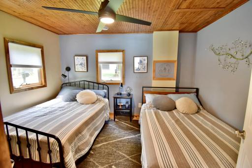 Spacious Primary BR w/ Grooved Wood Ceilings