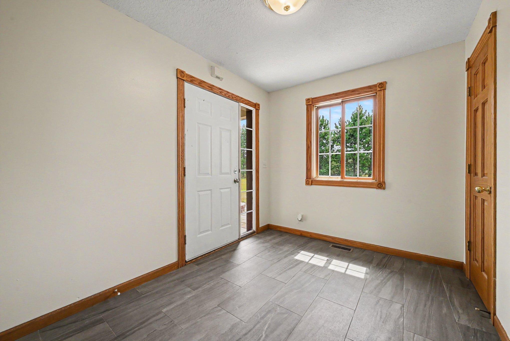 Bright and welcoming foyer with plenty of natural light.