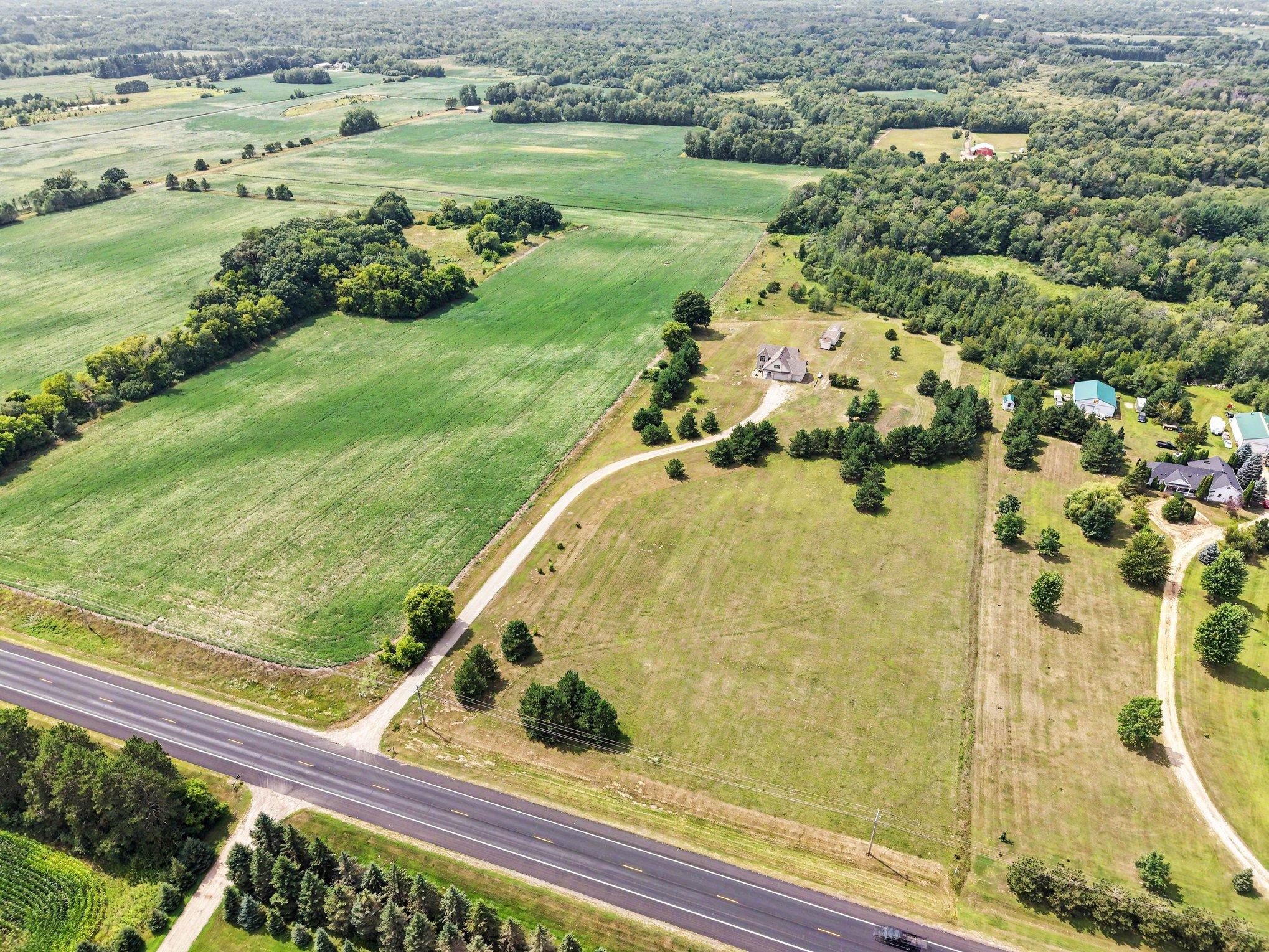 Aerial view showcasing the property's 10 acres of open space, privacy and beautiful country surroundings.