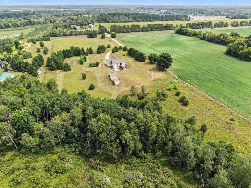 A wonderful mix of open, usuable land and mature trees offers space, privacy, and endless possibilites.