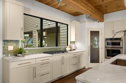 You won't mind cleaning up the Kitchen with these views!