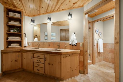 Upper Level Full Bath. Double Vanity. Extensive Tiling. Walk in Shower w/Double Shower Heads. Jetted Tub & More!