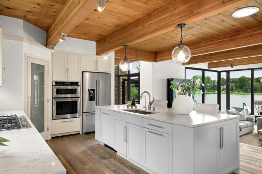 Quartz Counter Tops. Wood Ceilings. Stainless Appliances. Custom Cabinets. Walk in Pantry & More!