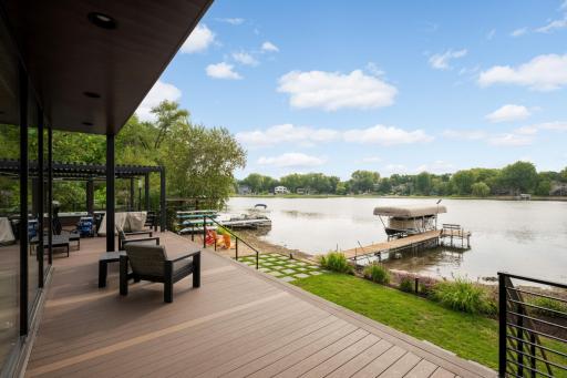 Pontoon, Lift, Dock and All Water Toys are Included in the Sale. Maintenance Free Decking. Custom Iron Railings & Pergola.