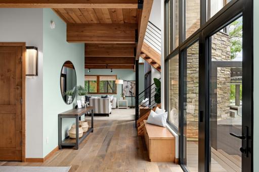 Open & Spacious Entry w/Full Glass Views Overlooking the Lake.