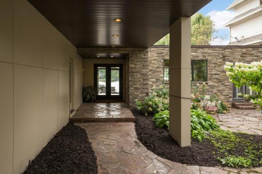 Pavered Walk Ways & Extensive Landscaping.