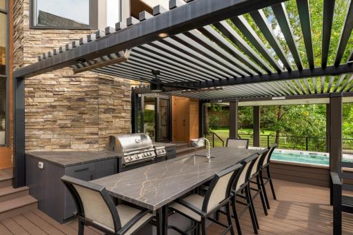 Fabulous Outdoor Kitchen & Entertaining Area! Grill. Quarts Top. Sink. Storage & So Much More!