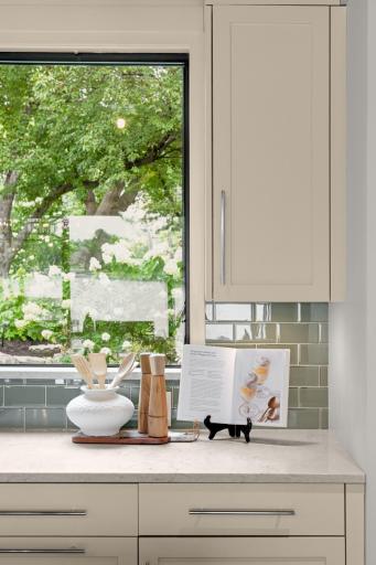 Newly Updated Kitchen. Tiled Backsplash. Quartz. Stainless Appliances. Custom Cabinets & More!