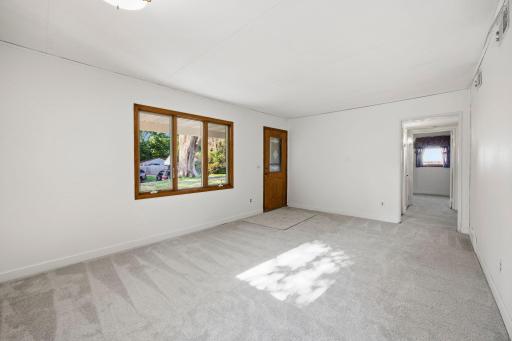 Well cared for home. Newer windows and doors all on one level! New carpet!